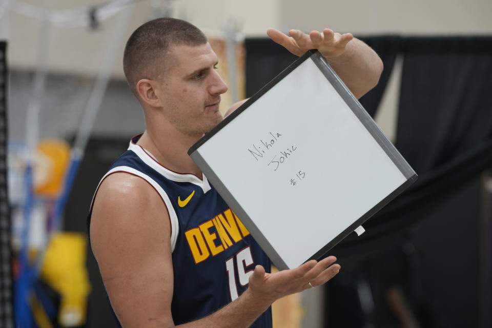 Denver Nuggets center Nikola Jokic (15) during the NBA basketball team's media day on Monday, Oct. 2, 2023, in Denver. (AP Photo/David Zalubowski)