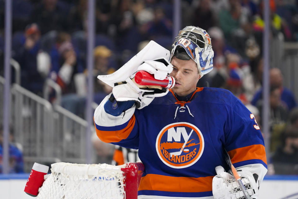 New York Islanders goaltender Ilya Sorokin takes a drink during a stoppage in play in the first period of the tema's NHL hockey game against the Boston Bruins in Elmont, N.Y., Friday, Dec. 15, 2023. (AP Photo/Peter K. Afriyie)