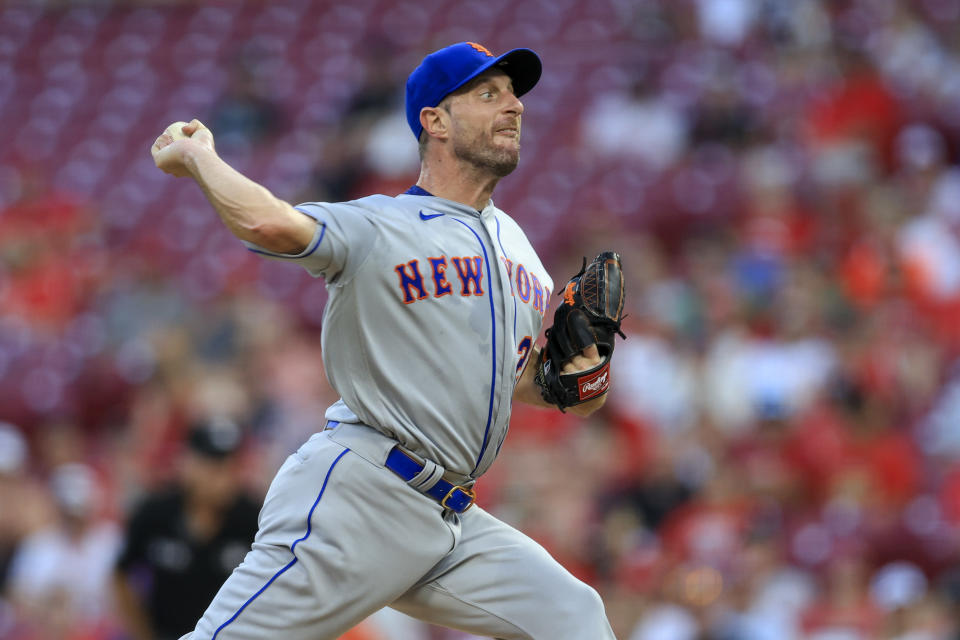 New York Mets' Max Scherzer throws during the third inning of the team's baseball game against the Cincinnati Reds in Cincinnati, Tuesday, July 5, 2022. (AP Photo/Aaron Doster)