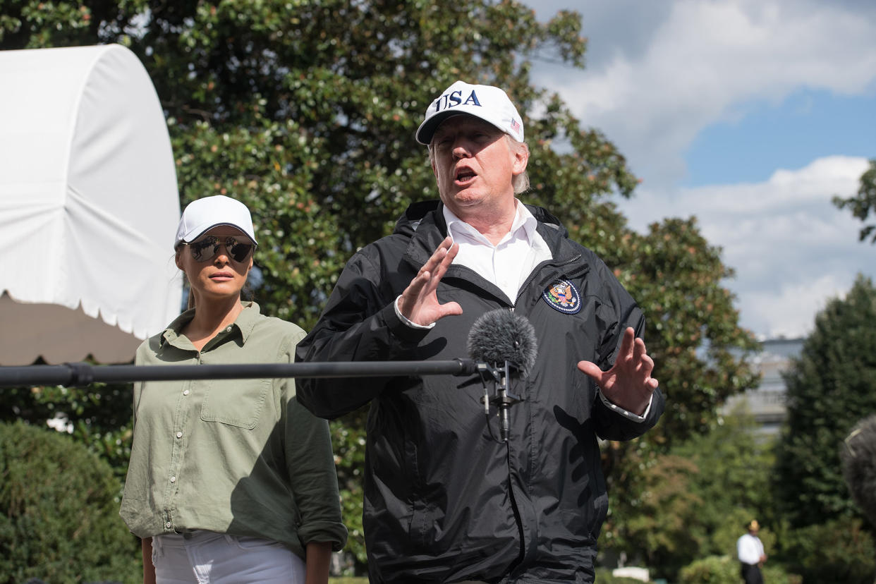 Donald speaks out on Hurricane Irma, with Melania Trump by his side. (Photo: Getty Images)