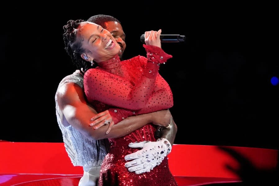 US singer-songwriter Usher performs with US singer-songwriter Alicia Keys (L) during Apple Music halftime show of Super Bowl LVIII between the Kansas City Chiefs and the San Francisco 49ers at Allegiant Stadium in Las Vegas, Nevada, February 11, 2024. (Photo by TIMOTHY A. CLARY / AFP) (Photo by TIMOTHY A. CLARY/AFP via Getty Images)