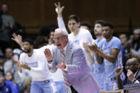 FILE - In this March 7, 2020, file photo, North Carolina coach Roy Williams applauds during the second half of the team's NCAA college basketball game against Duke in Durham, N.C. North Carolina announced Thursday, April 1, 2021, that Hall of Fame basketball coach Roy Williams is retiring after a 33-year career that includes three national championships. (AP Photo/Gerry Broome, File)