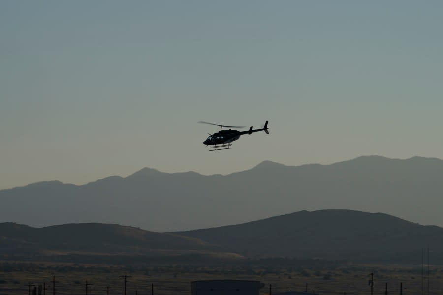 A helicopter recovery team depart the Michael Army Air Field before the arrival of a space capsule carrying NASA’s first asteroid samples on Sunday, Sept. 24, 2023, to a temporary clean room at Dugway Proving Ground, in Utah. The Osiris-Rex spacecraft released the capsule following a seven-year journey to asteroid Bennu and back. (AP Photo/Rick Bowmer)