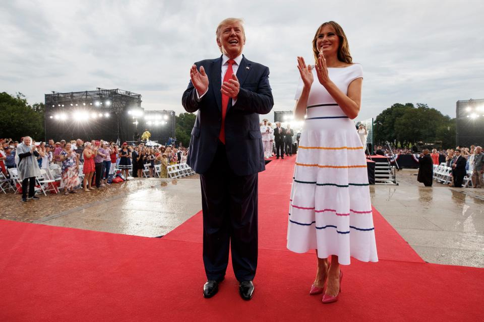 President Donald Trump and first lady Melania Trump are pictured leaving the Independence Day celebration in front of the Lincoln Memorial.