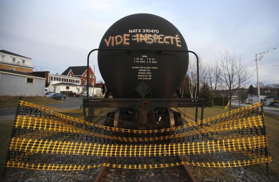 A tanker with an inscription which reads, "empty and inspected", is pictured on the rail track in Lac-Megantic