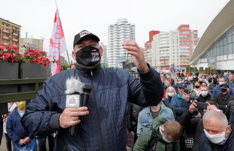 Blogger Sergei Tikhanovsky speaks during an opposition rally in Minsk