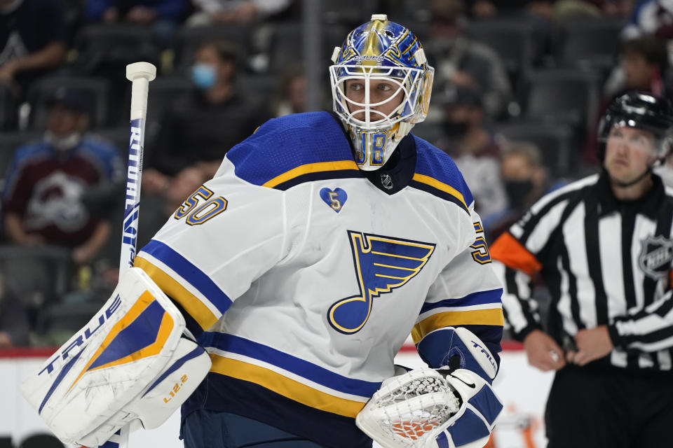 St. Louis Blues goaltender Jordan Binnington heads to the net during a timeout in the second period of Game 1 of an NHL hockey Stanley Cup first-round playoff series against the Colorado Avalanche, Monday, May 17, 2021, in Denver. (AP Photo/David Zalubowski)