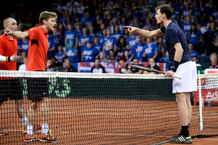 Belgium's David Goffin and Britain's Jamie Murray argue a call during their doubles match on the second day of the Davis Cup final in Ghent on November 28, 2015