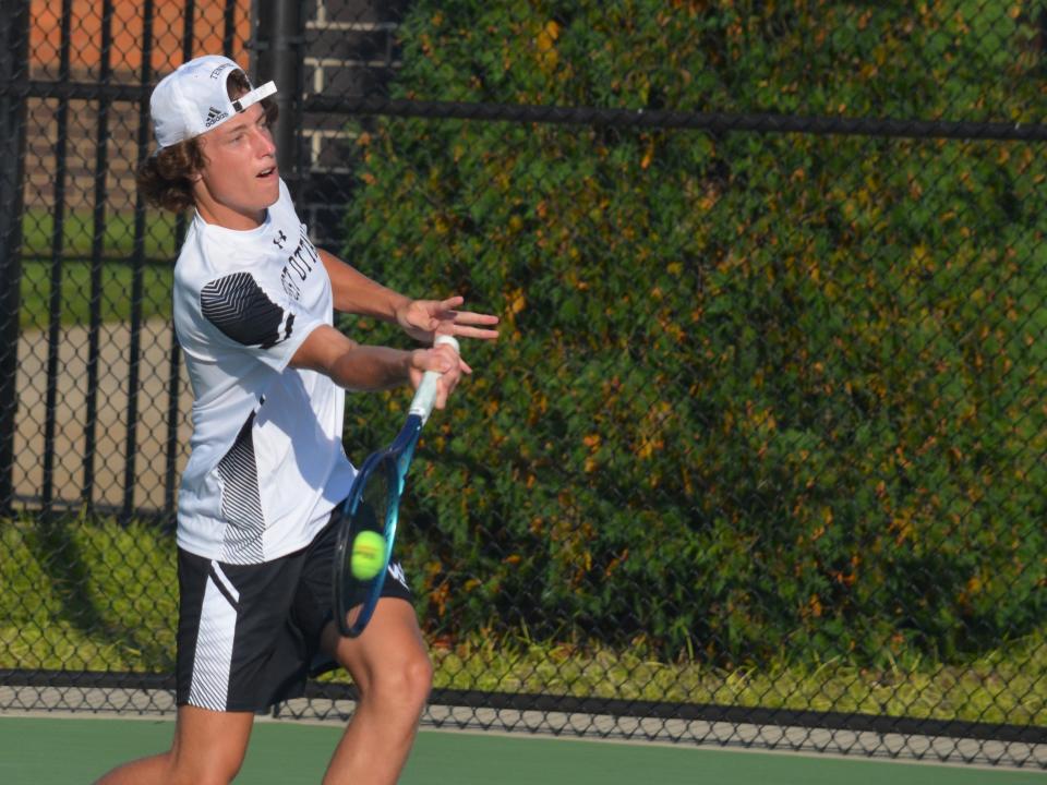 West Ottawa's Sebastian Dozeman won his No. 1 singles match against Holland on Thursday.