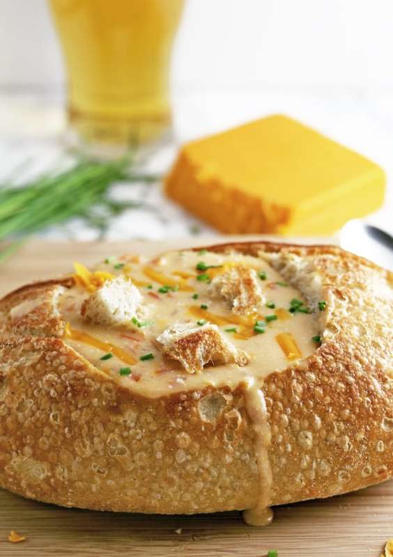 <p>The Thirsty Feast</p><p>Fill a bread bowl with this ultra cheese beer cheese soup for dinner this week!</p><p><strong>Get the recipe: <a href="https://www.honeyandbirch.com/slow-cooker-beer-cheese-soup/" rel="nofollow noopener" target="_blank" data-ylk="slk:Crock Pot Beer Cheese Soup;elm:context_link;itc:0;sec:content-canvas" class="link ">Crock Pot Beer Cheese Soup</a></strong></p>