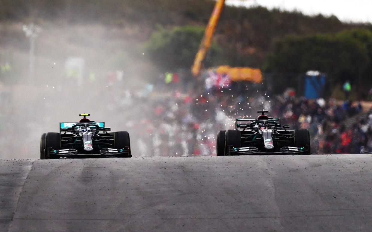 Valtteri Bottas of Finland driving the (77) Mercedes AMG Petronas F1 Team Mercedes W11 and Lewis Hamilton of Great Britain driving the (44) Mercedes AMG Petronas F1 Team Mercedes W11 on track during the F1 Grand Prix of Portugal at Autodromo Internacional do Algarve on October 25, 2020 in Portimao, Portugal - Dan Istitene - Formula 1 