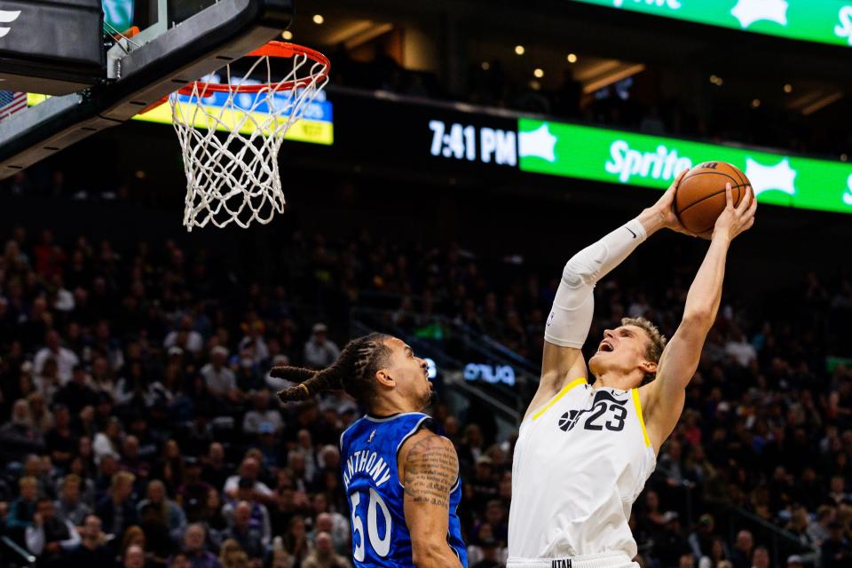 Utah Jazz forward Lauri Markkanen (23) shoots the ball over Orlando Magic guard <a class="link " href="https://sports.yahoo.com/nba/players/6407" data-i13n="sec:content-canvas;subsec:anchor_text;elm:context_link" data-ylk="slk:Cole Anthony;sec:content-canvas;subsec:anchor_text;elm:context_link;itc:0">Cole Anthony</a> (50) during an NBA basketball game between the Utah Jazz and Orlando Magic at the Delta Center in Salt Lake City on Thursday, Nov. 2, 2023. | Megan Nielsen, Deseret News