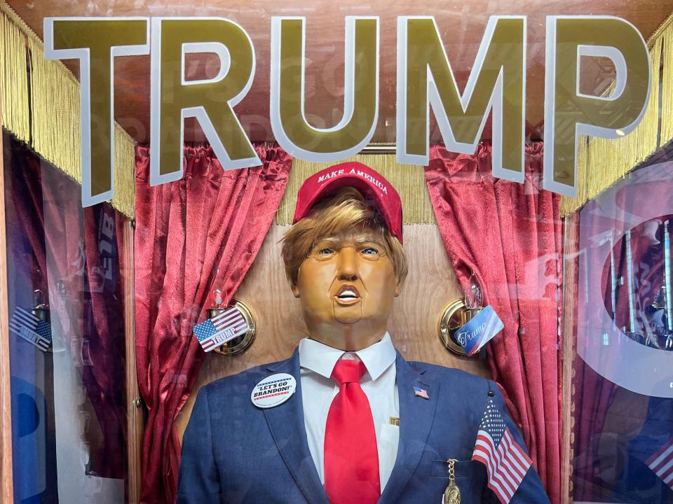Trump fortune teller machine with a pink crystal ball.