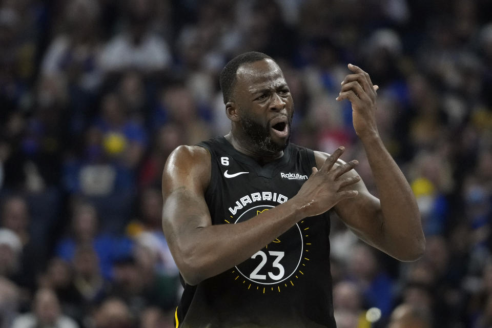 Golden State Warriors forward Draymond Green reacts during the first half of an NBA basketball game against the Memphis Grizzlies in San Francisco, Sunday, Dec. 25, 2022. (AP Photo/Godofredo A. Vásquez)
