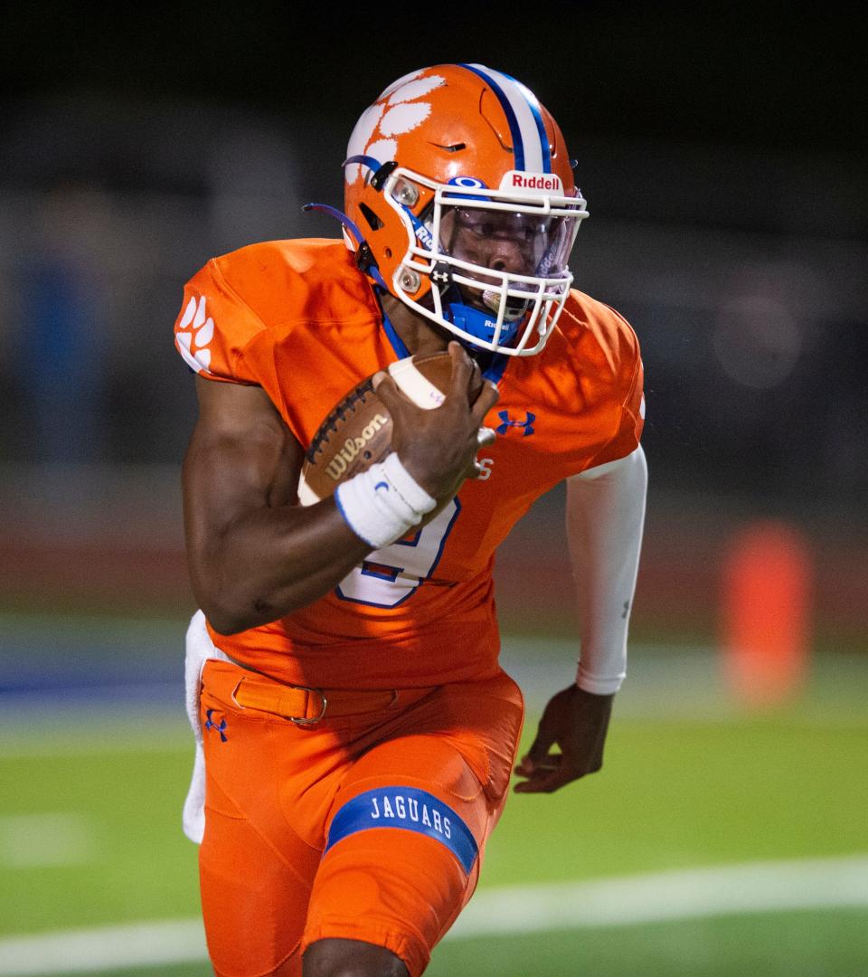 Madison Central's Vic Sutton (9) runs the ball during the team's game against Tupelo at Madison Central High School in Madison, Miss., Friday, Oct. 15, 2021. 