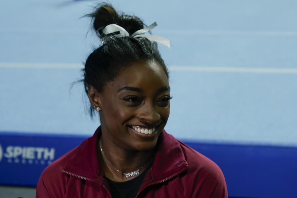 Simone Biles talks to the members of the media affter the U.S. Classic gymnastics competition Saturday, Aug. 5, 2023, in Hoffman Estates, Ill. (AP Photo/Morry Gash)