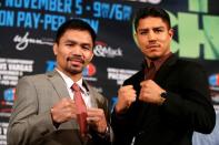USA Boxing - Manny Pacquiao & Jessie Vargas - Head-to-Head Press Conference - Beverly Hills Hotel, Beverly Hills - 8/9/16Manny Pacquiao & Jessie Vargas during the press conference. REUTERS/Lucy Nicholson