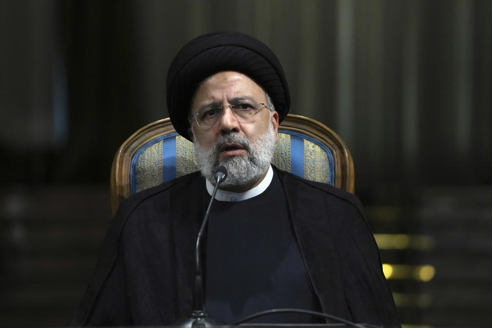 Iranian President Ebrahim Raisi speaks in a joint news briefing with his Venezuelan counterpart Nicolas Maduro at the Saadabad Palace in Tehran, Iran, Saturday, June 11, 2022. (AP Photo/Vahid Salemi)