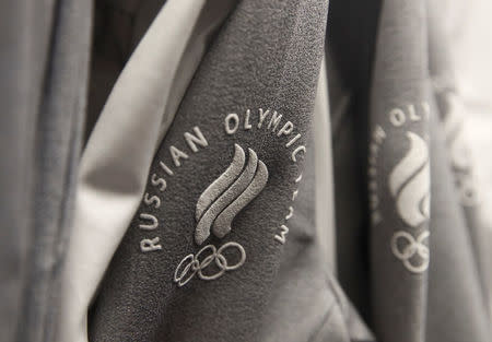 FILE PHOTO: The logo of Russian Olympic team is seen on the uniform designed by ZASPORT, the official clothing supplier for national athletes competing in 2018 Winter Olympics, during its presentation in Moscow, Russia January 22, 2018. REUTERS/Maxim Shemetov/File Photo