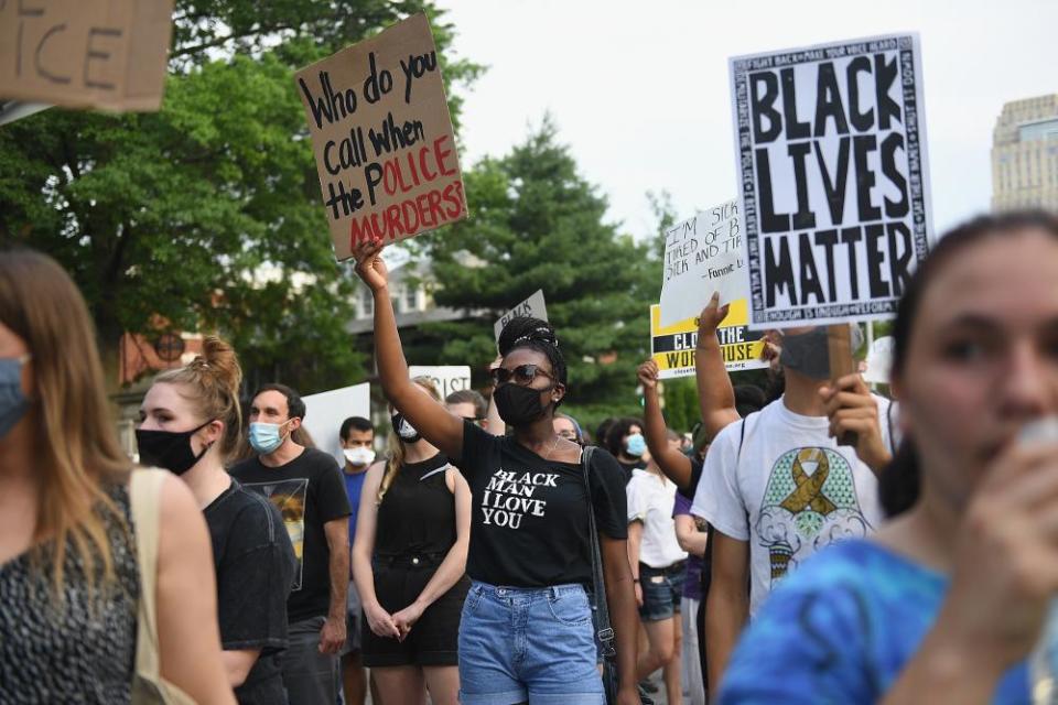 Protesters march against police brutality in St Louis, Missouri, in 2020.