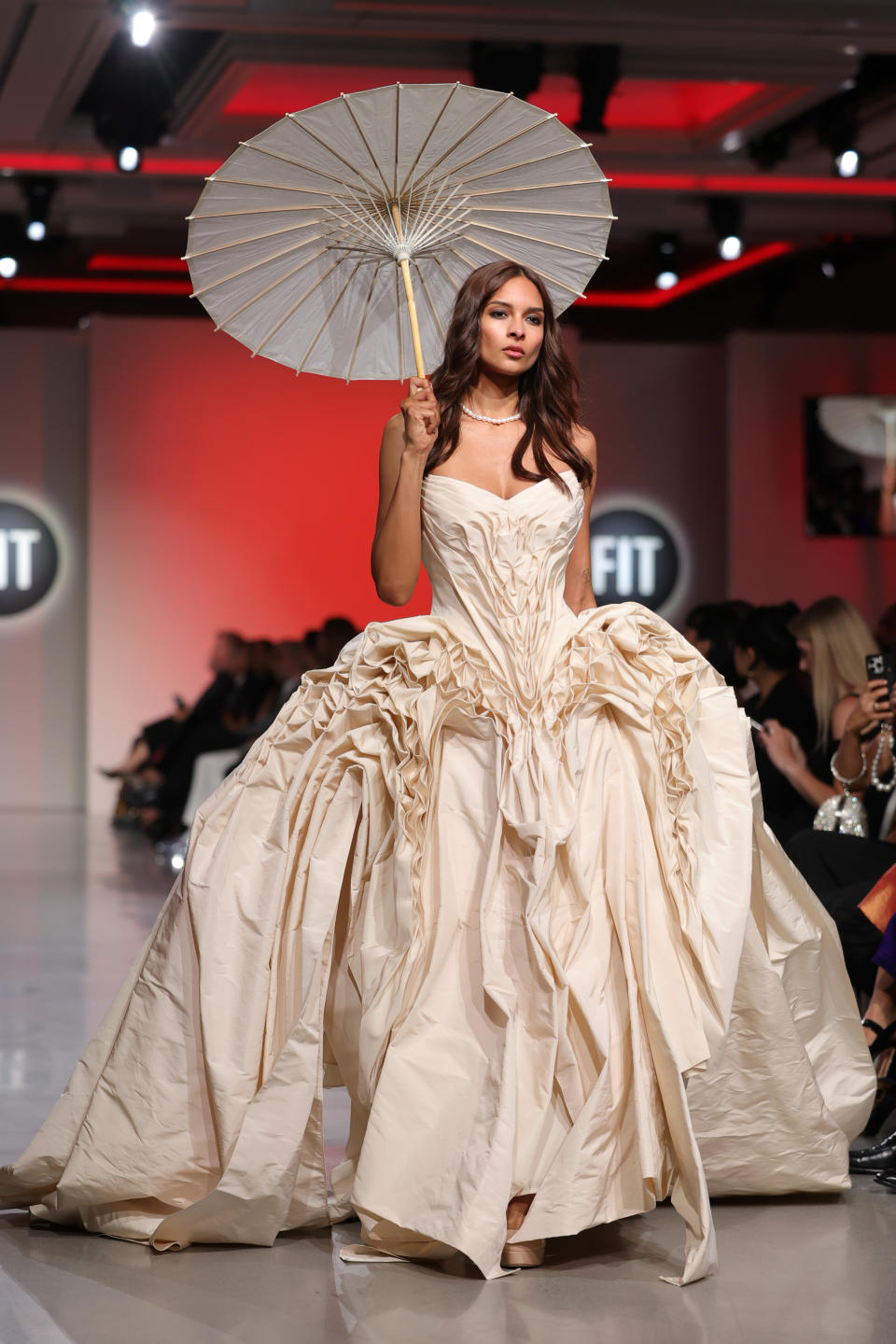 NEW YORK, NEW YORK - MAY 08: A model walks the runway wearing during the the FIT Annual Awards Gala and the FIT Future of Fashion Runway Show, presented by Macy's at The Glasshouse on May 08, 2024 in New York City. (Photo by Michael Loccisano/Getty Images)