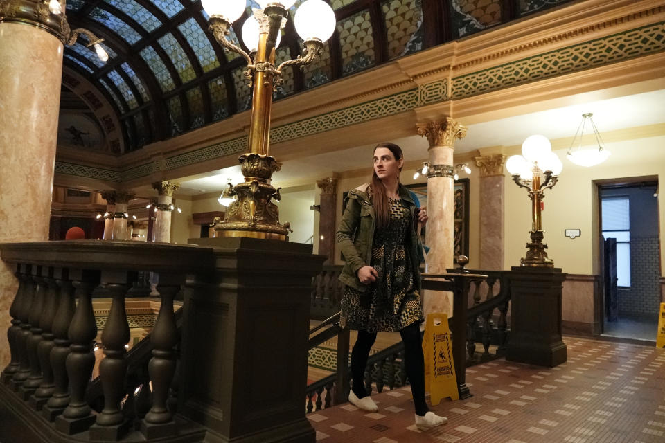 State Rep. Zooey Zephyr walks into the State Capitol on her first day of remote voting, Thursday, April 27, 2023 in Helena, Mont. Zephyr was barred from participating on the House floor as Republican leaders voted Wednesday to silence her for the rest of 2023 session after she protested GOP leaders' decision earlier in the week to silence her. (AP Photo/Brittany Peterson)