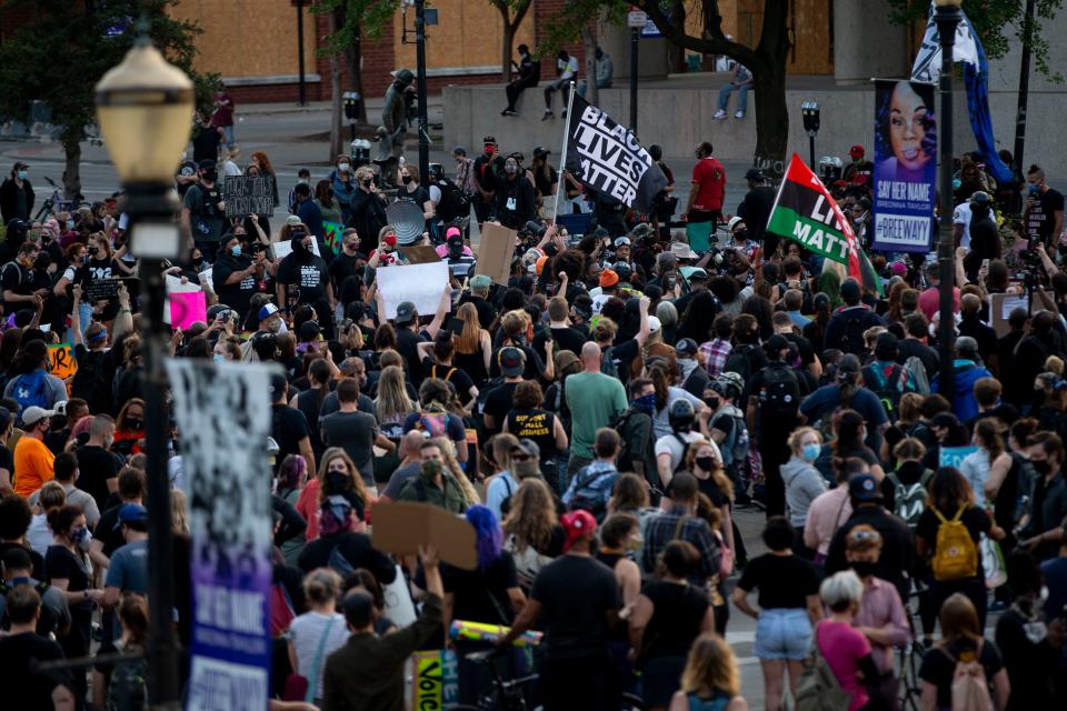 Protesters in Louisville, Kentucky, on Sept. 26, 2020, after no charges were brought in Breonna Taylor's death by police shooting.