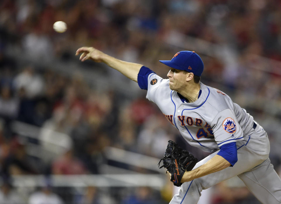 New York Mets starting pitcher Jacob deGrom delivers a pitch during the seventh inning of the team's baseball game against the Washington Nationals, Friday, Sept. 21, 2018, in Washington. The Mets won 4-2. (AP Photo/Nick Wass)