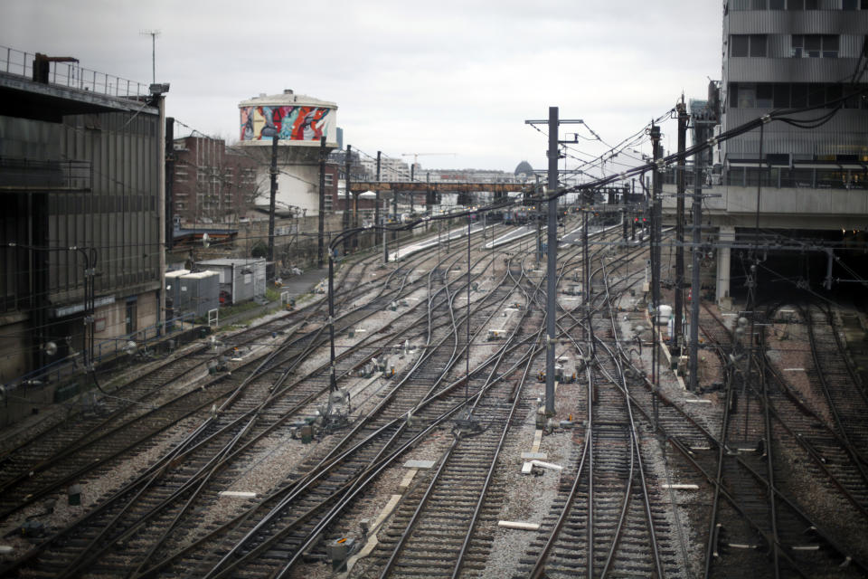 Empties railway tracks at the Gare d'Austerlitz railway station, in Paris, Friday, Dec. 27, 2019. France's punishing transportation troubles may ease up slightly over Christmas, but unions plan renewed strikes and protests in January to resist government plans to raise the retirement age to 64. (AP Photo/Thibault Camus)