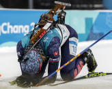 <p>Anastasiya Kuzmina, of Slovakia, collapse in the finish area after winning the silver medal in the women’s 10-kilometer biathlon pursuit at the 2018 Winter Olympics in Pyeongchang, South Korea, Monday, Feb. 12, 2018. (AP Photo/Andrew Medichini) </p>