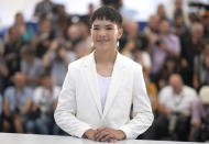 LaDainian Crazy Thunder poses for photographers at the photo call for the film 'War Ponyr' at the 75th international film festival, Cannes, southern France, Saturday, May 21, 2022. (AP Photo/Petros Giannakouris)