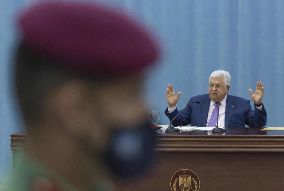 Palestinian President Mahmoud Abbas heads the Palestinian leadership meeting at his headquarters, in the West Bank city of Ramallah, Tuesday, May 5, 2020. (AP Photo/Nasser Nasser, Pool)