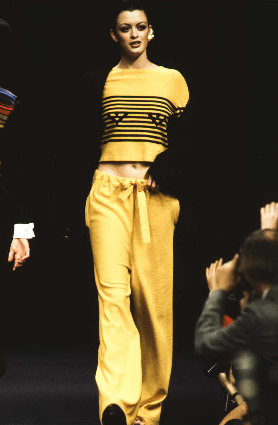 A model wears a striped sweater and slouchy trousers at Sonia Rykiel’s spring 1993 show in Paris.