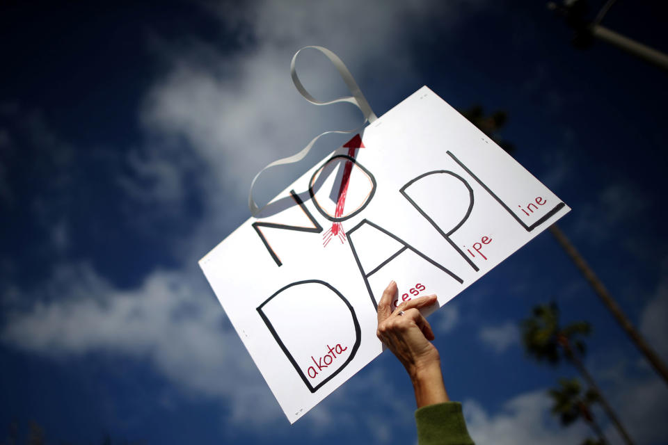 <p>Protesters in Los Angeles demonstrate on Sept.13, 2016, against the Dakota Access oil pipeline (DAPL) near the Standing Rock Sioux reservation. (Photo: Lucy Nicholson/Reuters) </p>