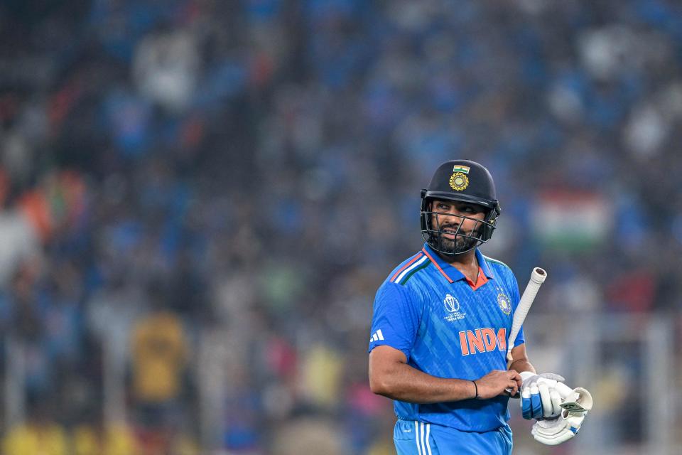 Rohit Sharma walks away after losing his wicket (AFP via Getty Images)