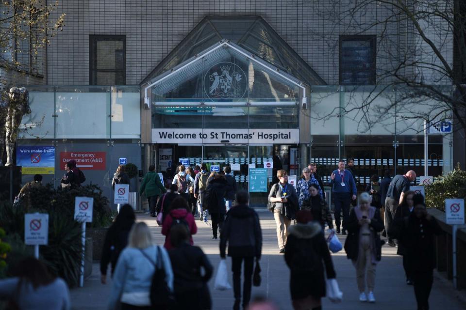 People arrive at St Thomas' hospital in central London where Prime Minister Boris Johnson is in intensive care (AFP via Getty Images)