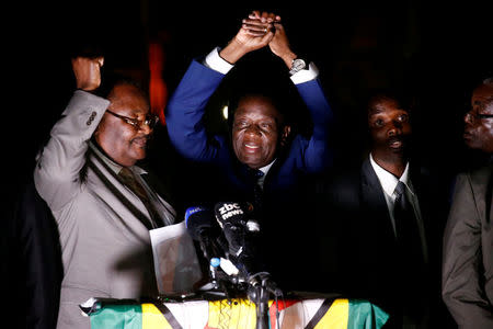 Zimbabwe's former Vice-President Emmerson Mnangagwa, who is due to be sworn in to replace Robert Mugabe as President, addresses supporters in Harare, Zimbabwe, November 22, 2017. REUTERS/Mike Hutchings