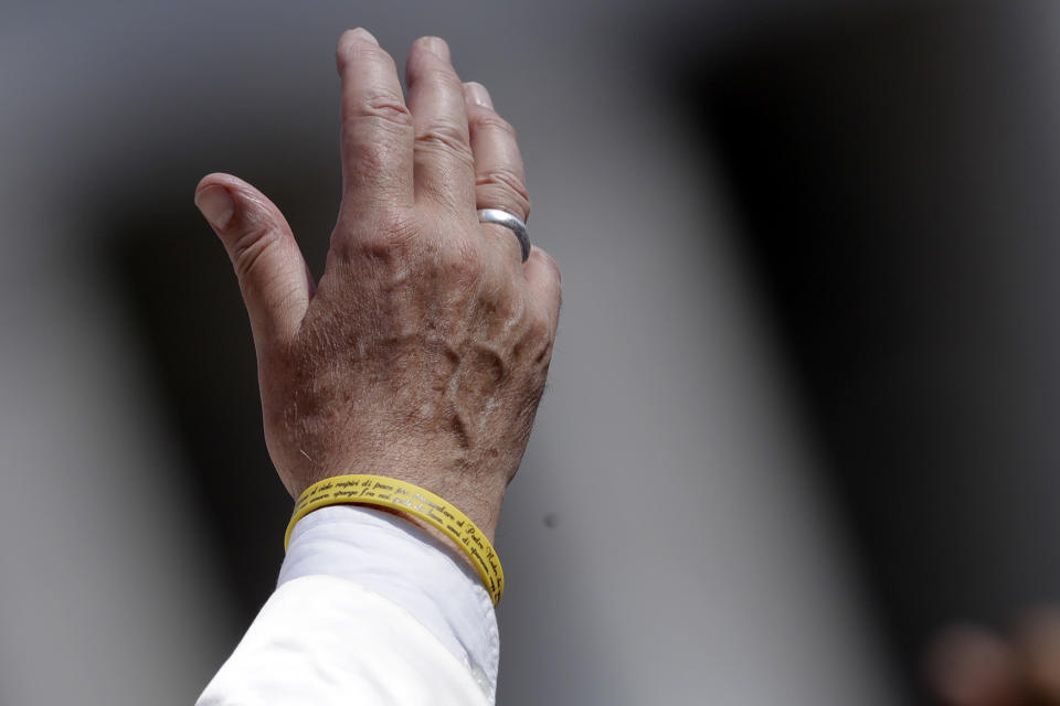 Yellow bracelet at the Vatican