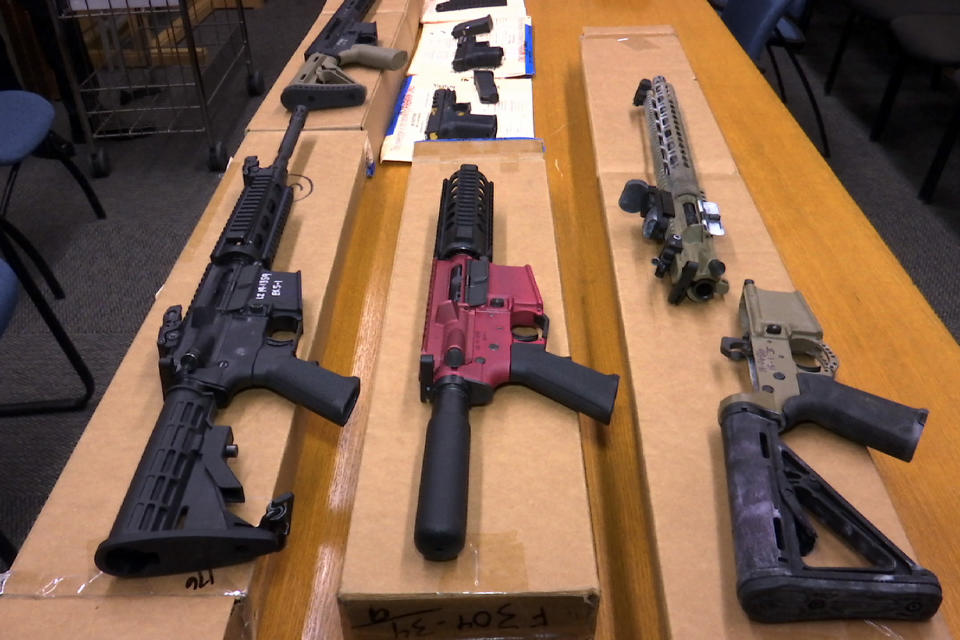 FILE - "Ghost guns" are displayed at the headquarters of the San Francisco Police Department in San Francisco, on Nov. 27, 2019. A federal judge on Wednesday, March 6, 2024, permanently banned a Florida gun retailer from shipping gun parts to New York that officials say can be used to assemble untraceable ghost guns and sold without background checks. (AP Photo/Haven Daley, File)