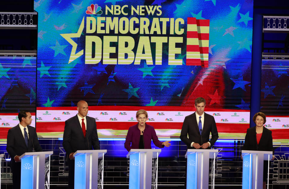 Democratic presidential candidate Sen. Elizabeth Warren, D-Mass., center, answers a question, during the Democratic primary debate hosted by NBC News at the Adrienne Arsht Center for the Performing Art, Wednesday, June 26, 2019, in Miami. Listening from left are, former Housing and Urban Development Secretary Julian Castro, Sen. Cory Booker, D-N.J., former Texas Rep. Beto O’Rourke, and Sen. Amy Klobuchar, D-Minn. (AP Photo/Wilfredo Lee)