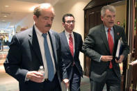 Wells Fargo Chairman Stephen Sanger (L) and CEO Tim Sloan (R) leave a meeting with reporters after the annual shareholder meeting in Jacksonville, Florida, U.S., April 25, 2017. REUTERS/Phelan Ebenhack