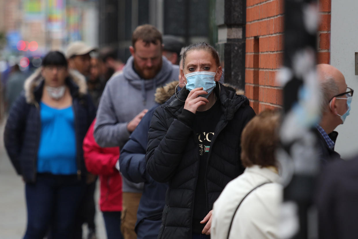  A member of the public is seen wearing a face mask, as masks become mandatory in shops and supermarkets in England.