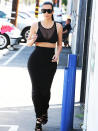 <p><b>LOS ANGELES 2015</b><br>Kim's version of athleisure involves a sheer-paneled sports bra and Jersey knit skirt.</p>