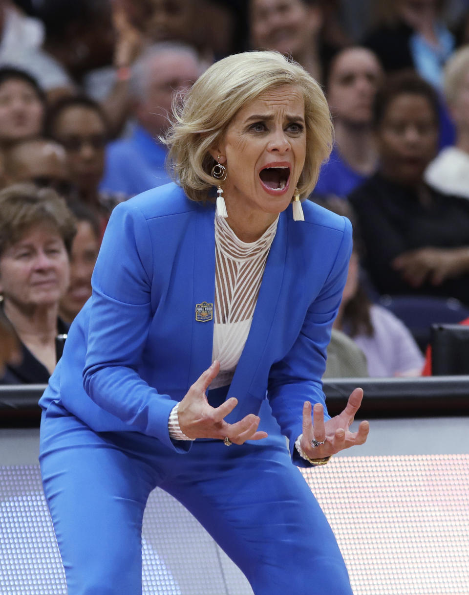 FILE - Baylor coach Kim Mulkey encourages her team during the first half against Notre Dame in the Final Four championship game of the NCAA women's college basketball tournament in Tampa, Fla., in this Sunday, April 7, 2019, file photo. Kobe Bryant was a major proponent of women’s basketball, and his posthumous induction into the Basketball Hall of Fame this weekend will be alongside three legends of the women’s game in Kim Mulkey, Tamika Catchings and Barbara Stevens. (AP Photo/Chris O'Meara, File)