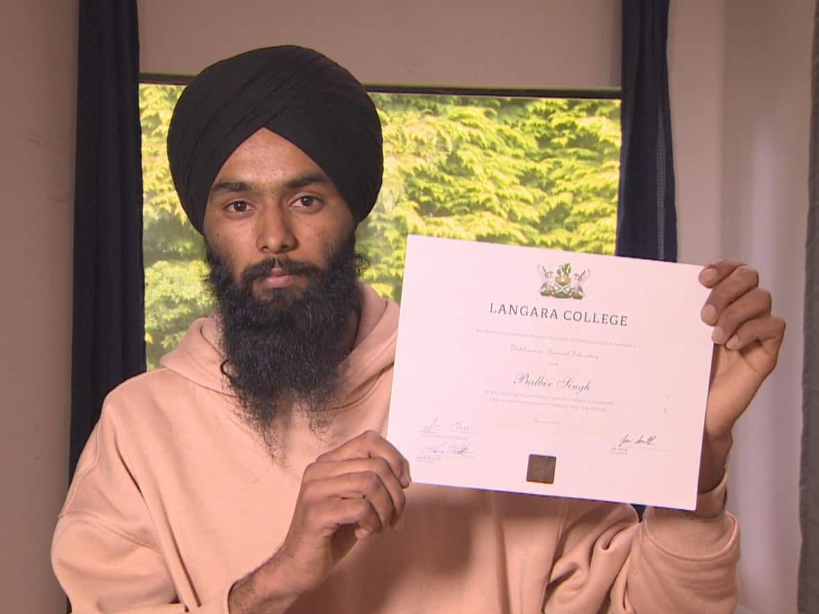 Balbir Singh holds his diploma from Langara College. Singh faces potential deportation after an immigration consultant allegedly used fake documents in Singh's student visa application. (Shawn Foss/CBC News - image credit)