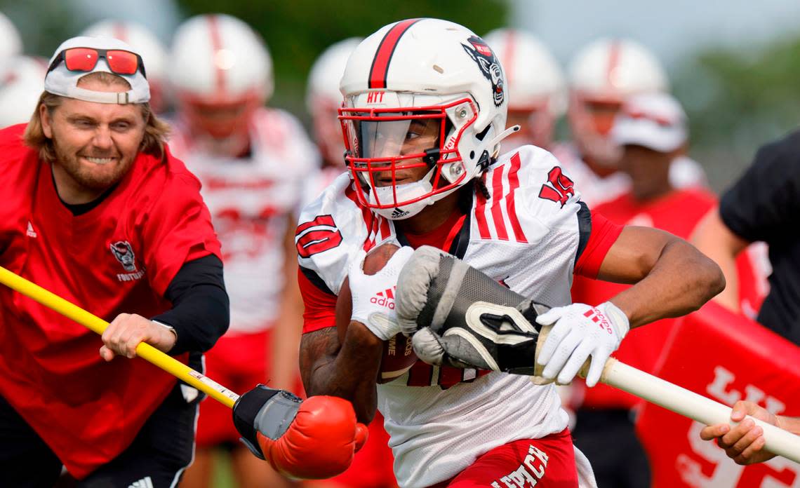 N.C. State wide receiver Kevin ‘KC’ Concepcion (10) runs drills during the Wolfpack’s first fall practice in Raleigh, N.C., Wednesday, August 2, 2023. Ethan Hyman/ehyman@newsobserver.com