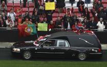 The hearse carrying the coffin of Eusebio crosses the Luz stadium in Lisbon January 6, 2014.