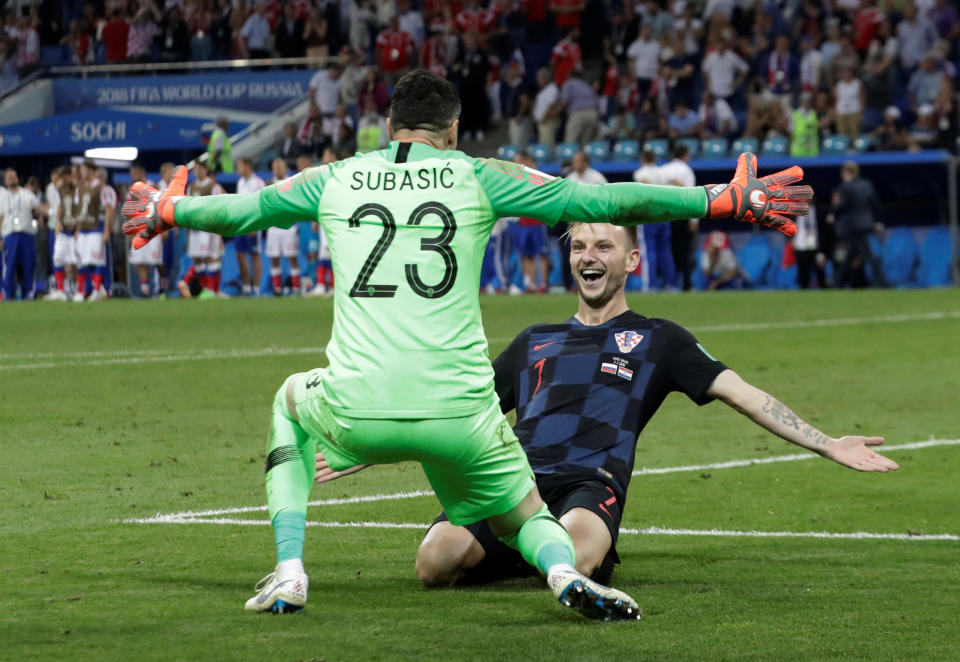 <p>Ivan Rakitic celebrates with goalkeeper Danijel Subasic </p>