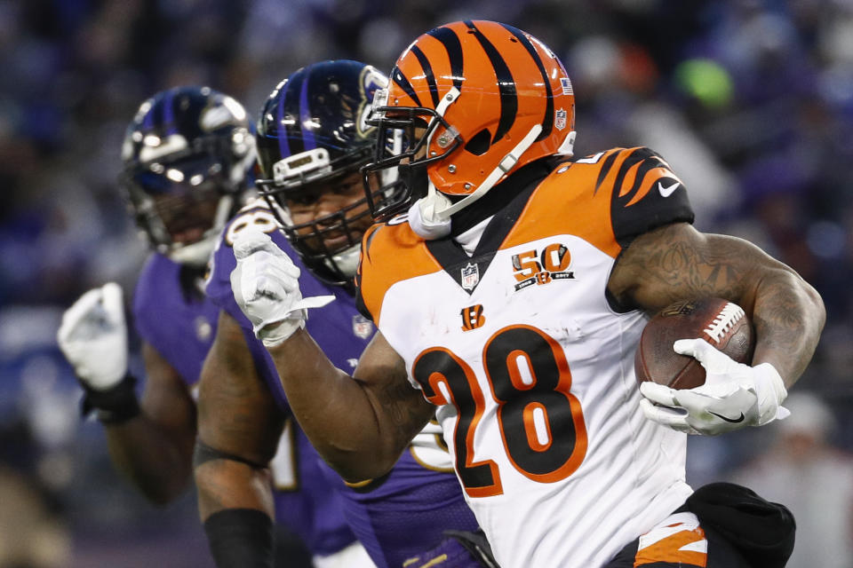 Joe Mixon figures to receive plenty of work in the season ahead. At least one Yahoo expert adores him. (AP Photo/Patrick Semansky)