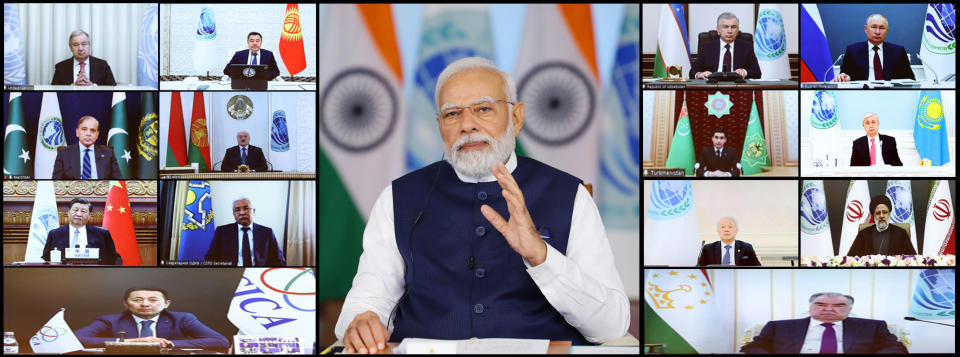 This photograph released by India government's Press Information Bureau shows Indian Prime Minister Narendra Modi, center address a virtual summit of the Shanghai Cooperation Organization, Tuesday, July 4, 2023. (Press Information Bureau via AP)